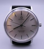 A gentleman's Omega Seamaster De Ville stainless steel wristwatch. 3.5 cm wide.
