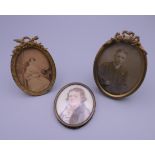 A 19th century miniature portrait on ivory of a gentleman and two small brass photograph frames. 6.