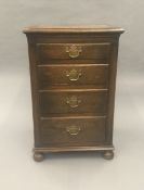 A small oak chest of drawers. 45.5 cm wide, 70 cm high, 40 cm deep.