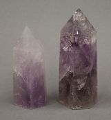 Two mineral specimen obelisks. The largest 11 cm high.