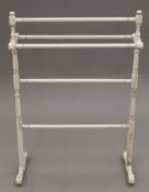 A Victorian white painted towel rail. 62 cm wide.