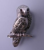 A silver marcasite bird brooch. 3 cm high.