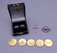 A boxed pair of Armani cufflinks, a silver cross pendant, etc.