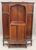 A Victorian/Edwardian mahogany billiards/snooker cue stand. 135 cm wide x 184 cm high.