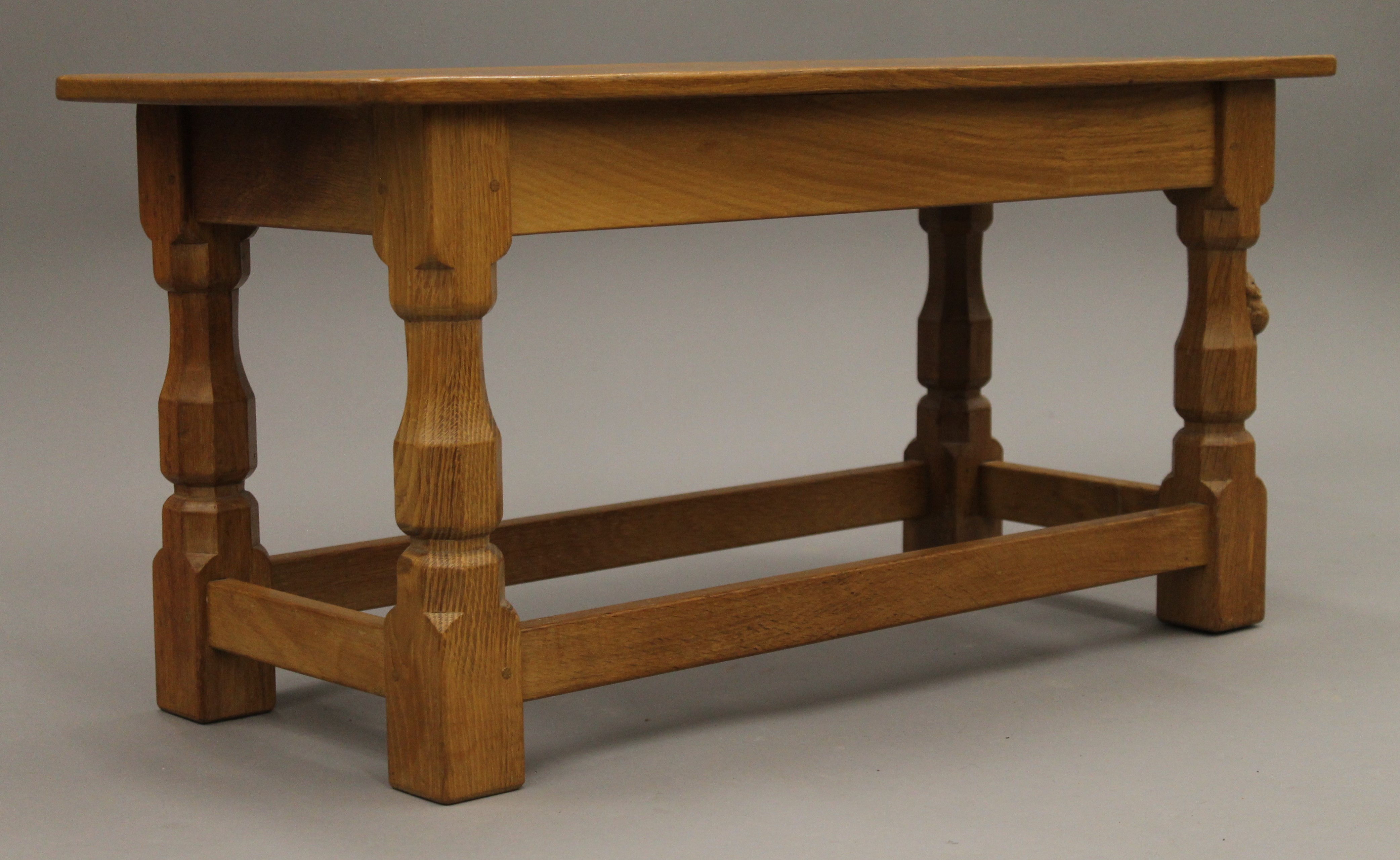 A Robert 'Mouseman' Thompson of Kilburn rectangular adzed oak coffee table. 82 cm long, 35. - Image 3 of 6