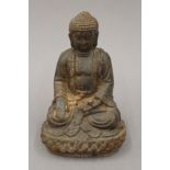 An iron model of Buddha. 22 cm high.