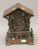 A Blackforest cuckoo clock. 34 cm high.