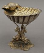 A silver plated clam shell stand. 11.5 cm high.