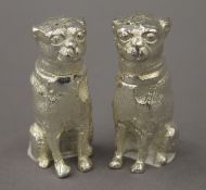 A pair of silver plated dog formed peppers. 6.5 cm high.