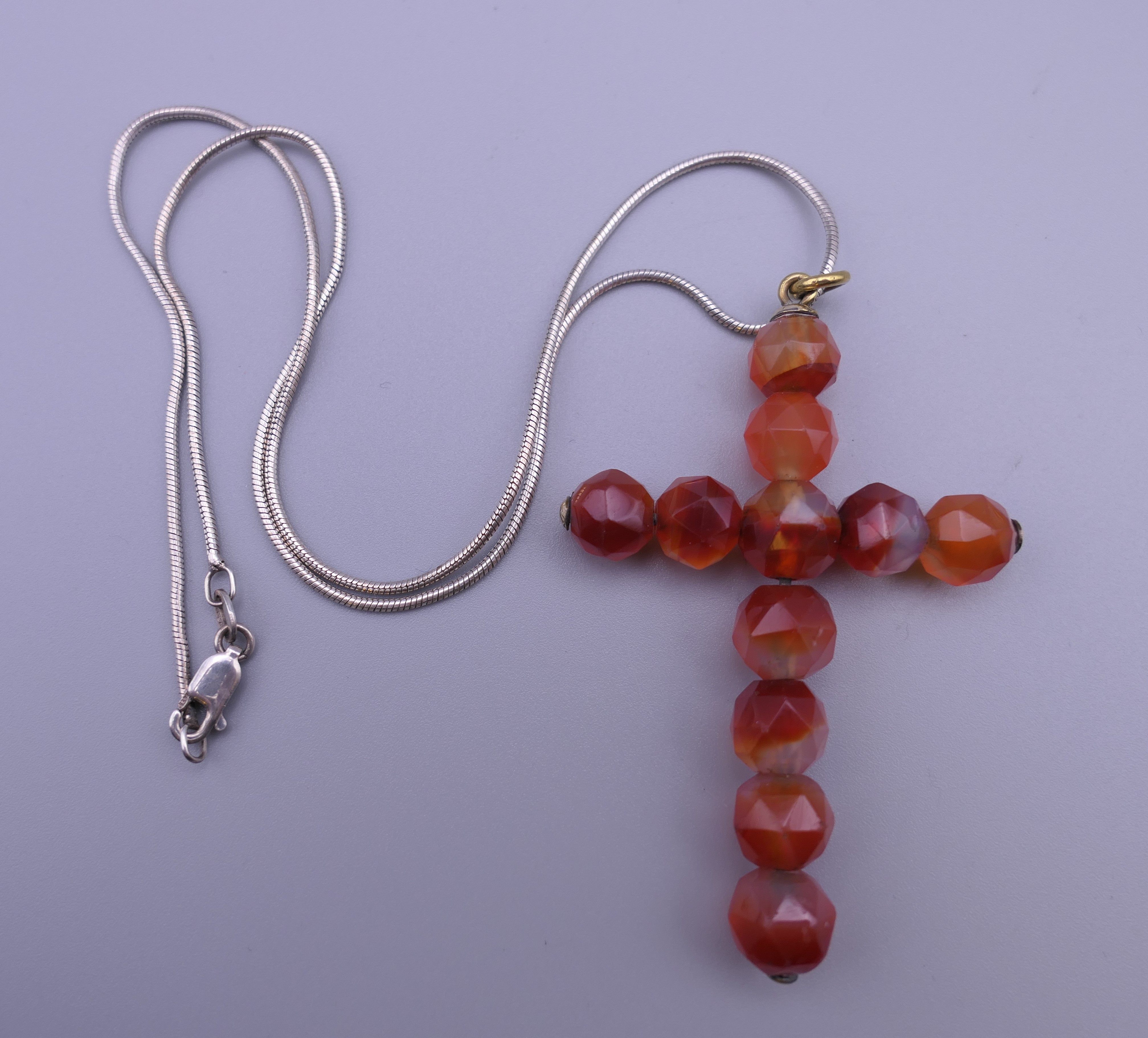 An antique banded agate hardstone cross and a faceted carnelian bead cross on a 925 silver chain. - Image 4 of 10