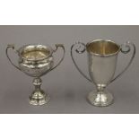 Two small silver trophy cups. The largest 11 cm high. 4.4 troy ounces.