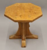A Robert 'Mouseman' Thompson of Kilburn octagonal adzed oak coffee table. 50.5 cm wide, 47 cm high.
