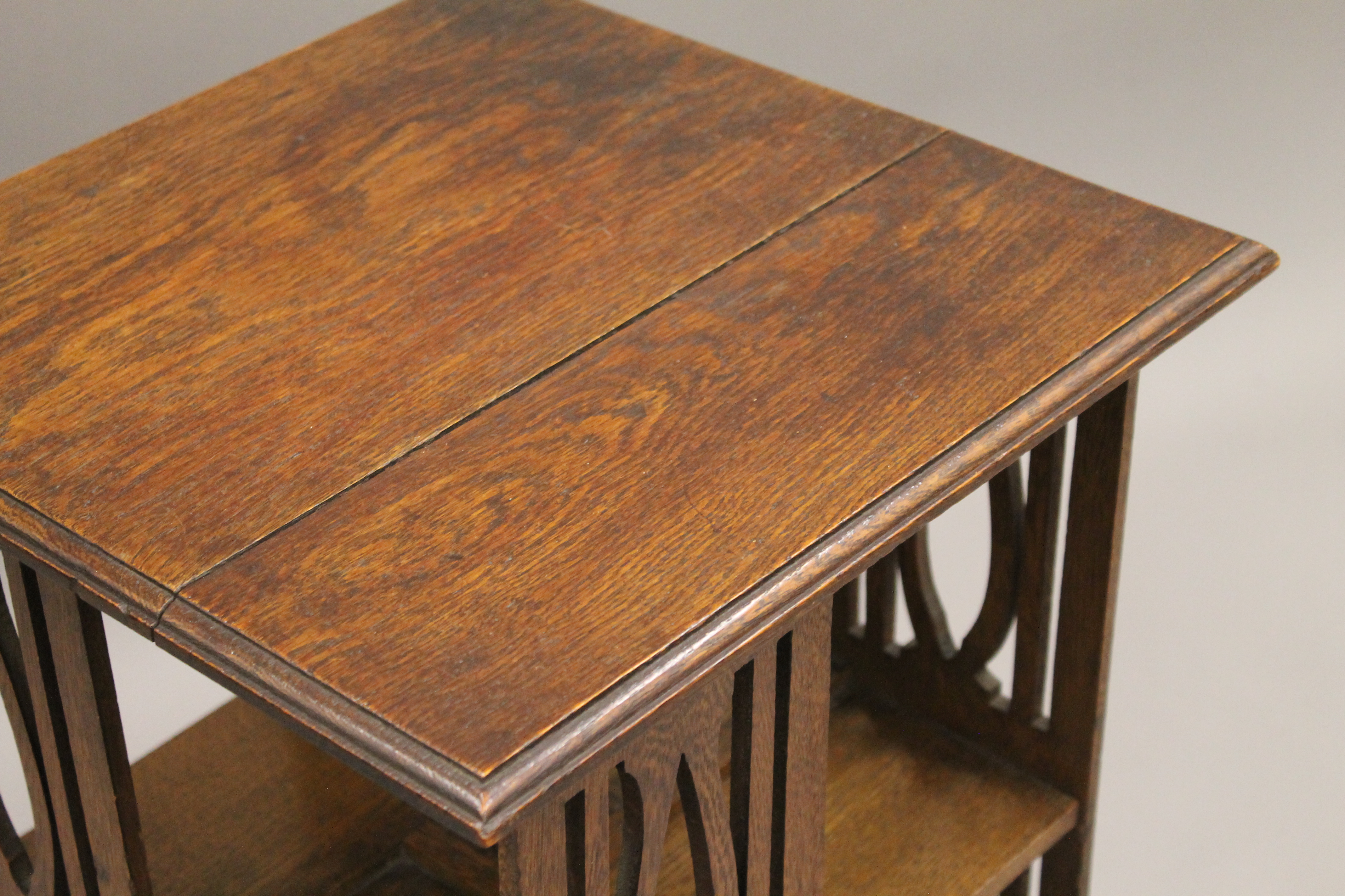 An early 20th century oak revolving bookcase. 65 cm high. - Image 4 of 4