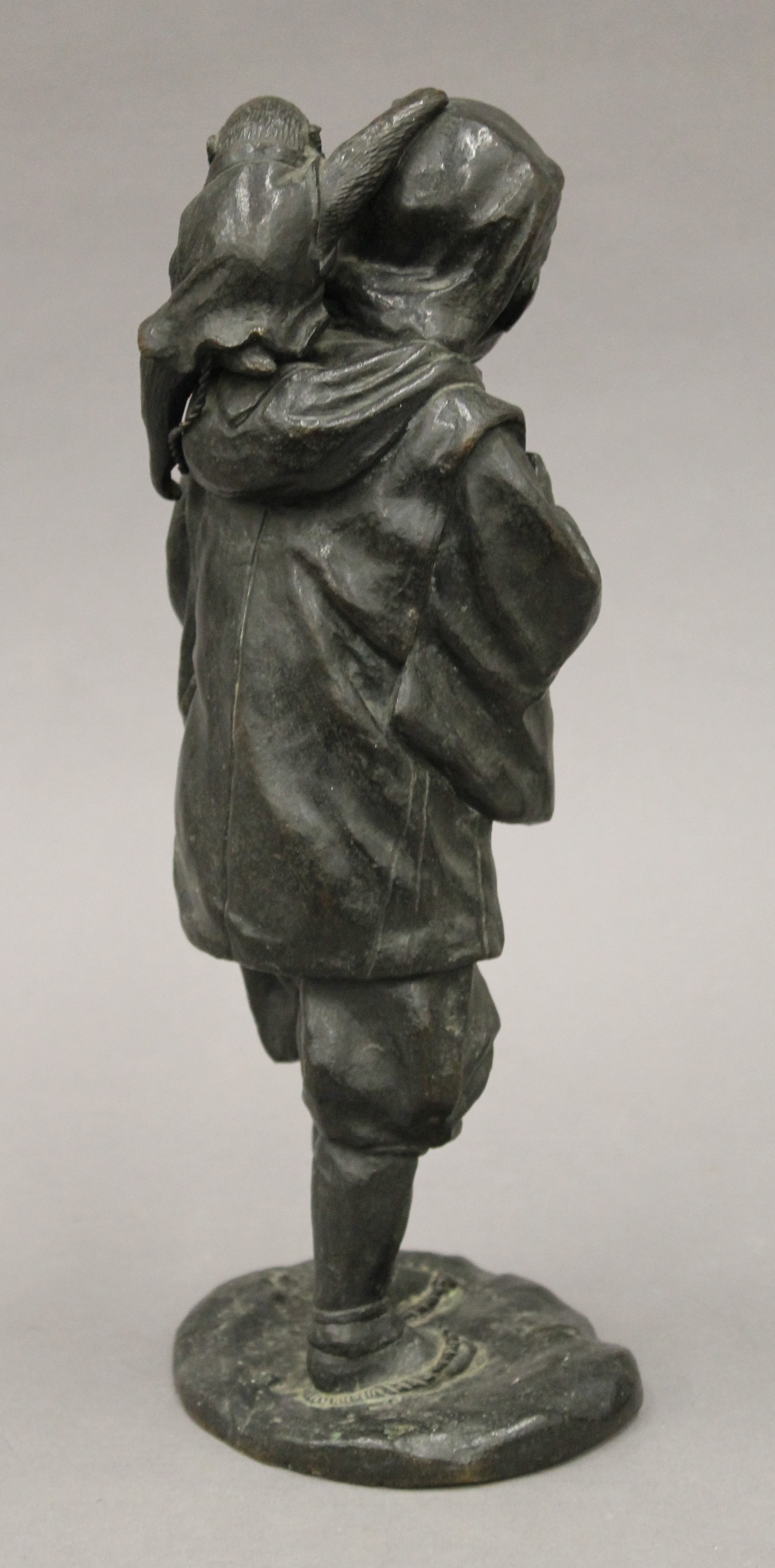 A Japanese Meiji period bronze model of a man with a monkey. 32 cm high. - Image 5 of 7