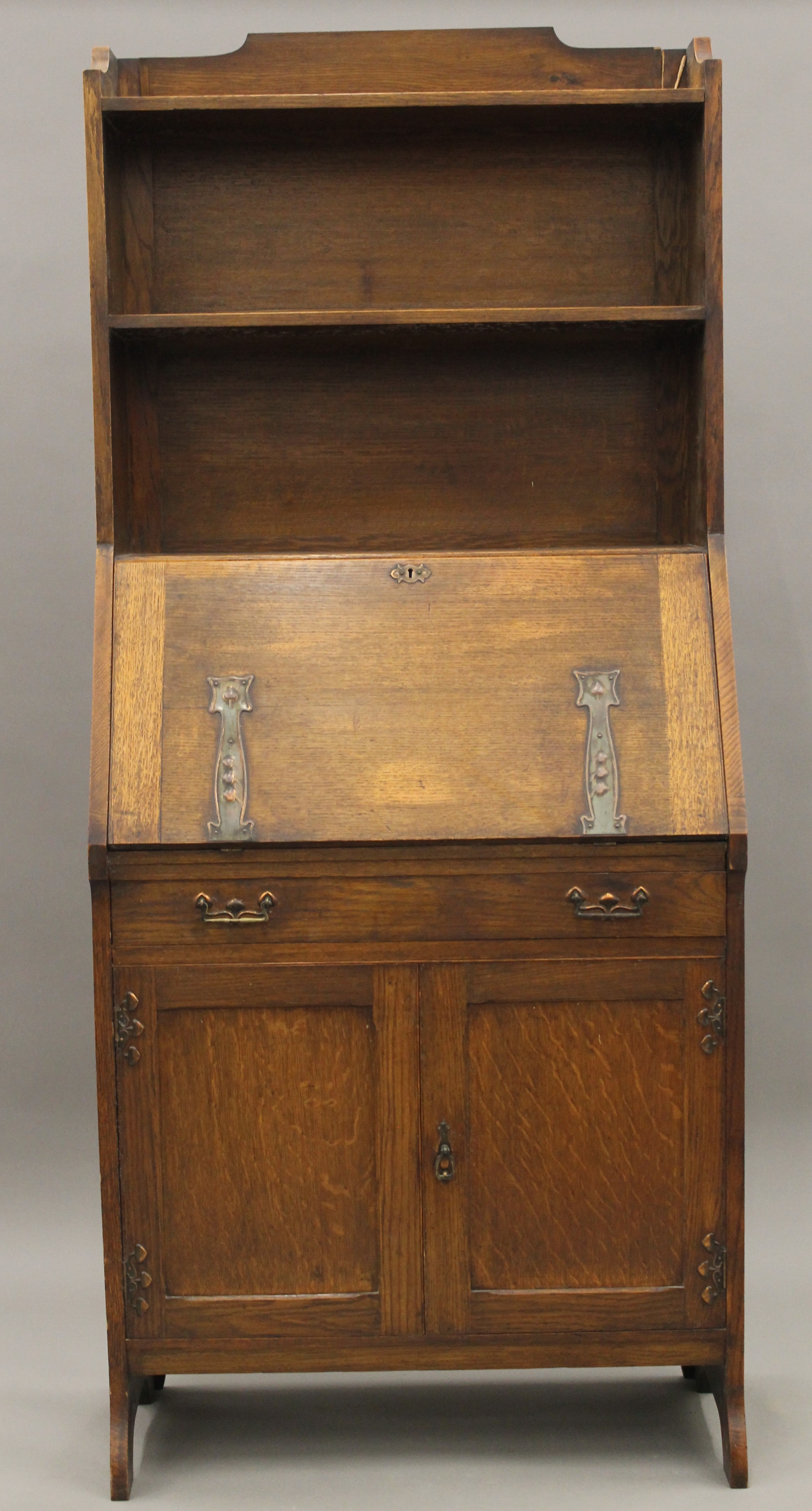 An Arts and Crafts oak hall bureau bookcase. 76 cm wide. - Image 2 of 11