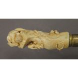 A walking stick with a carved bone handle formed as mice. 87.5 cm long.