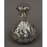 A silver overlay scent bottle. 12 cm high.