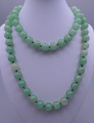 A string of jade beads. Approximately 88 cm long.