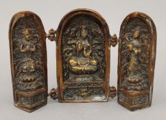 A bronze triptych.