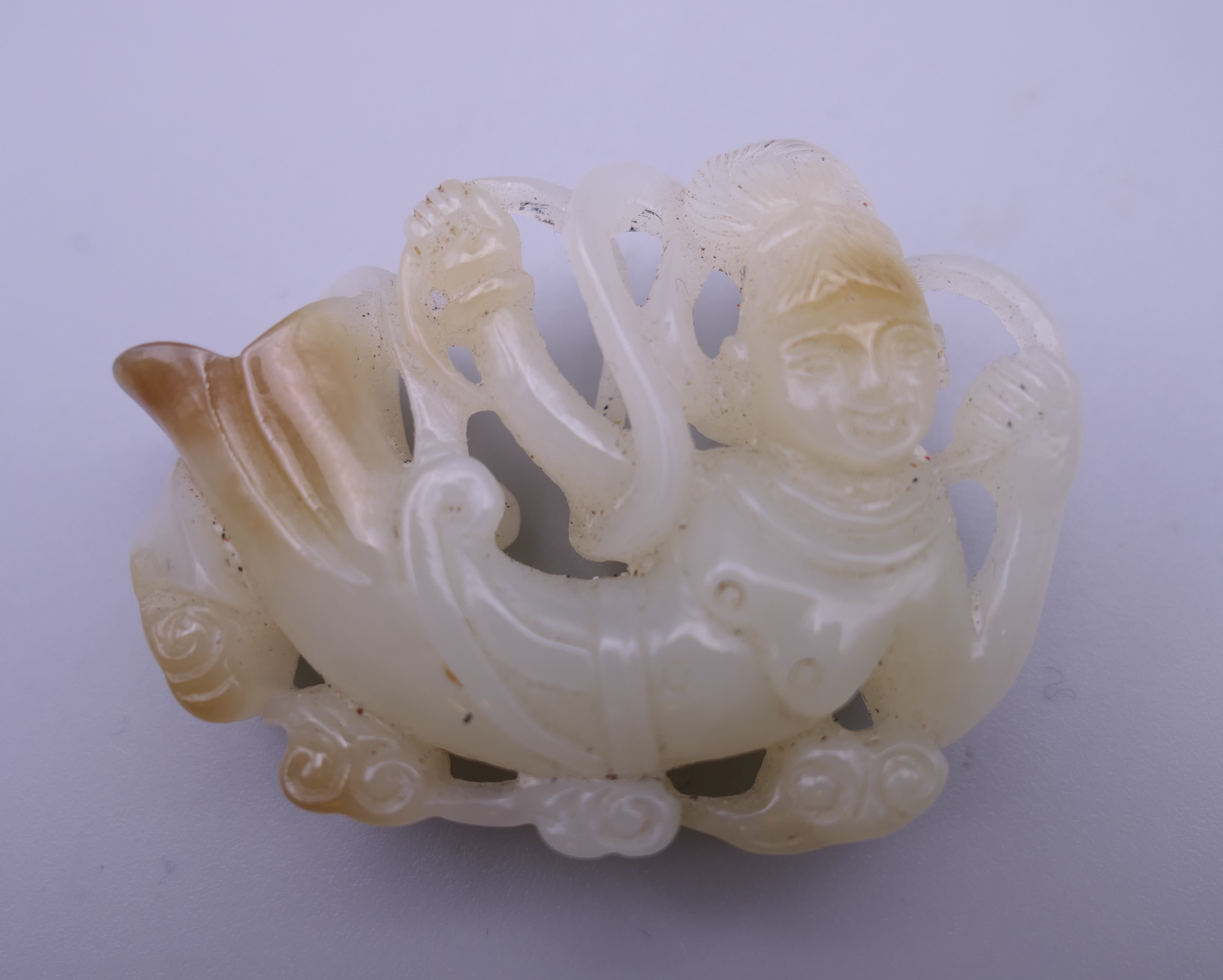 A Chinese jade carving of Guanyin. 5.5 cm wide.