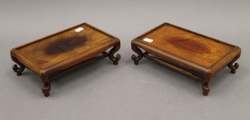 A pair of Chinese wooden stands. Each 24.5 cm wide.