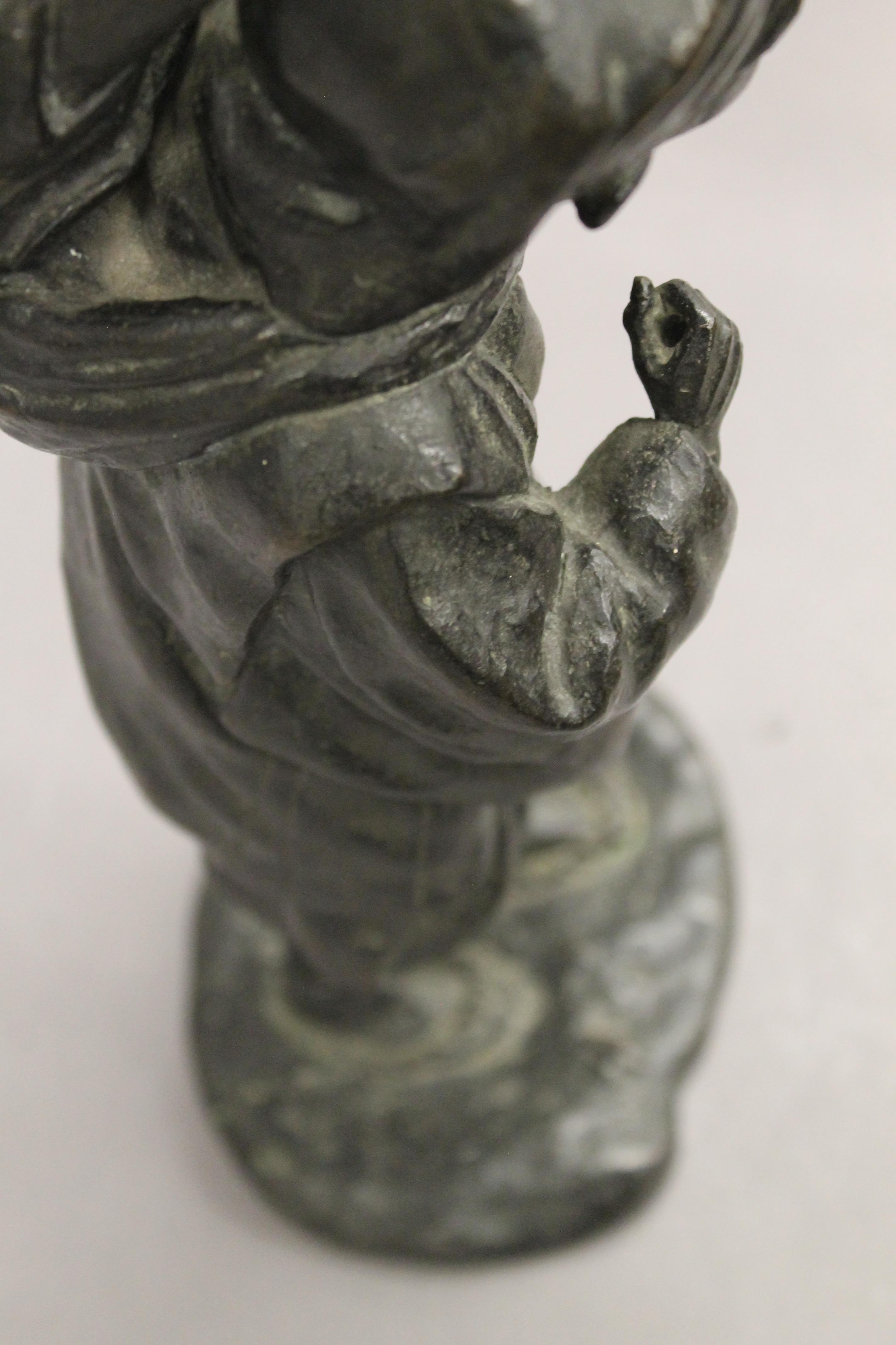 A Japanese Meiji period bronze model of a man with a monkey. 32 cm high. - Image 6 of 7