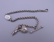 A Victorian ladies silver watch chain, stamped Real Silver. 23 cm long. 11.3 grammes.