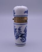 An unmarked gold mounted blue porcelain scent bottle. 6.5 cm high.