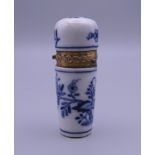 An unmarked gold mounted blue porcelain scent bottle. 6.5 cm high.