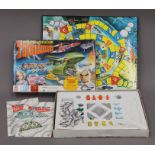 A Thunderbirds Tracy Island, rockets and figures plus game.