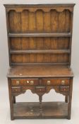 An 18th century style oak dresser by Titchmarsh & Goodwin for Liberty. 91 cm wide.