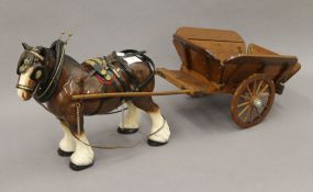 A model of a shire horse and cart. 28 cm high.