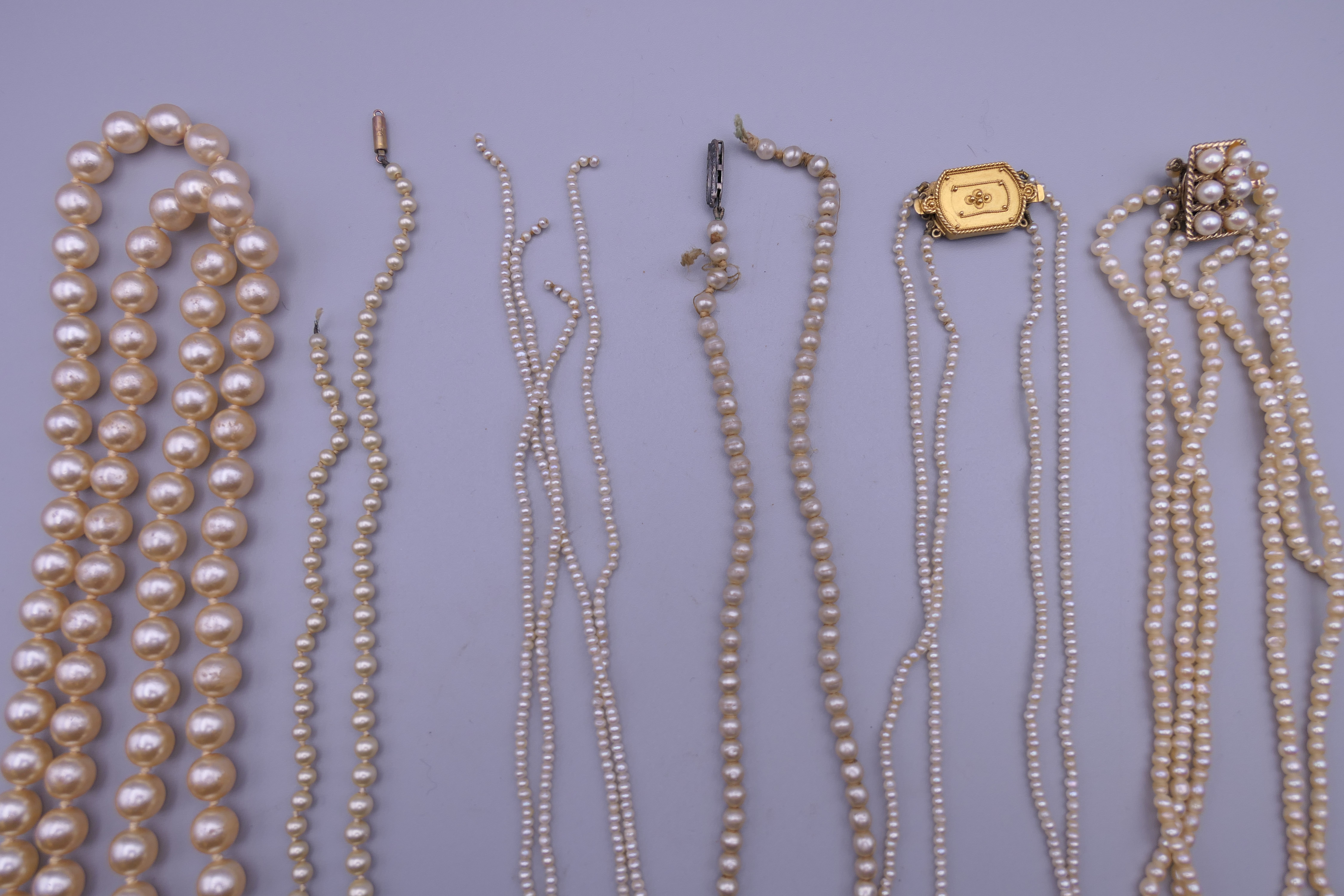 A quantity of pearl necklaces, one with a 9 ct gold clasp. - Image 2 of 5