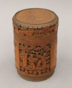 A late 19th century Chinese carved bamboo lidded box, containing a quantity of bone counters.