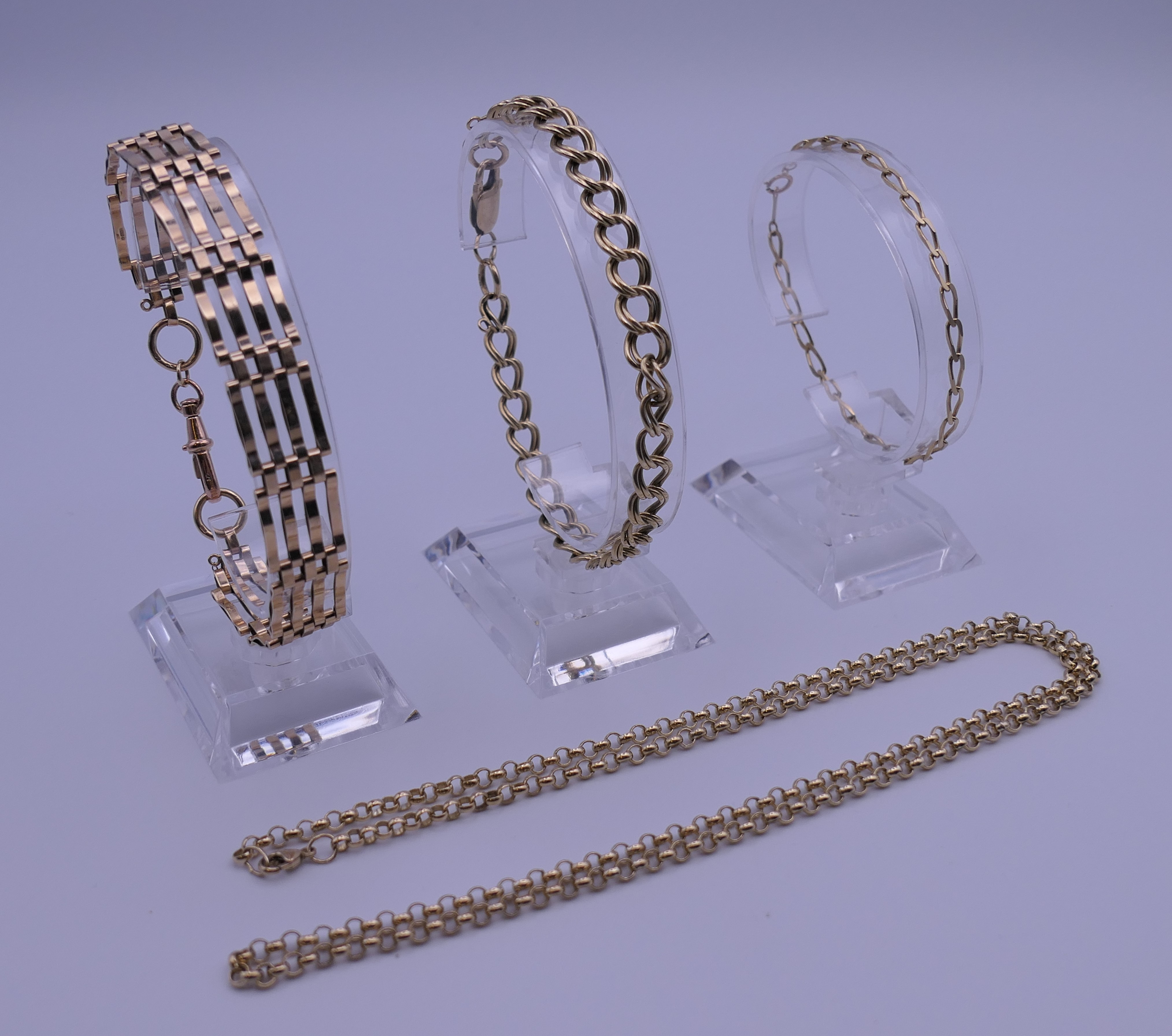 Three 9 ct gold bracelets and a 9 ct gold necklace. 34.5 grammes.