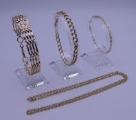 Three 9 ct gold bracelets and a 9 ct gold necklace. 34.5 grammes.