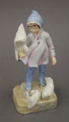 A Royal Worcester porcelain figure modelled by Freda Doughty, entitled 'Fantails'. 18.5 cm high.