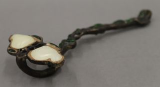 A bronze ruyi sceptre.