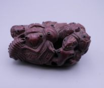 A small wooden netsuke formed as insects. 5 cm long.