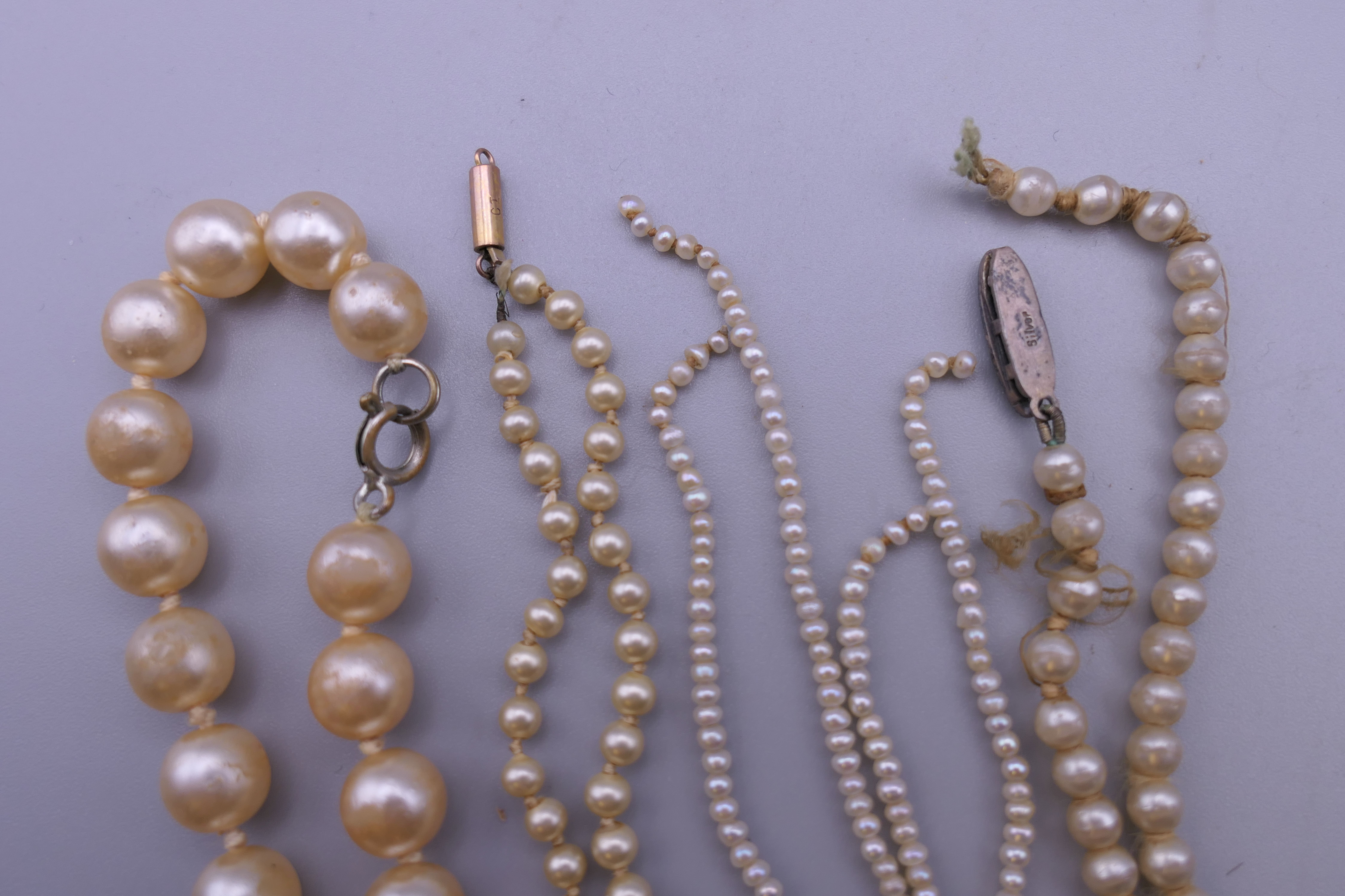 A quantity of pearl necklaces, one with a 9 ct gold clasp. - Image 5 of 5