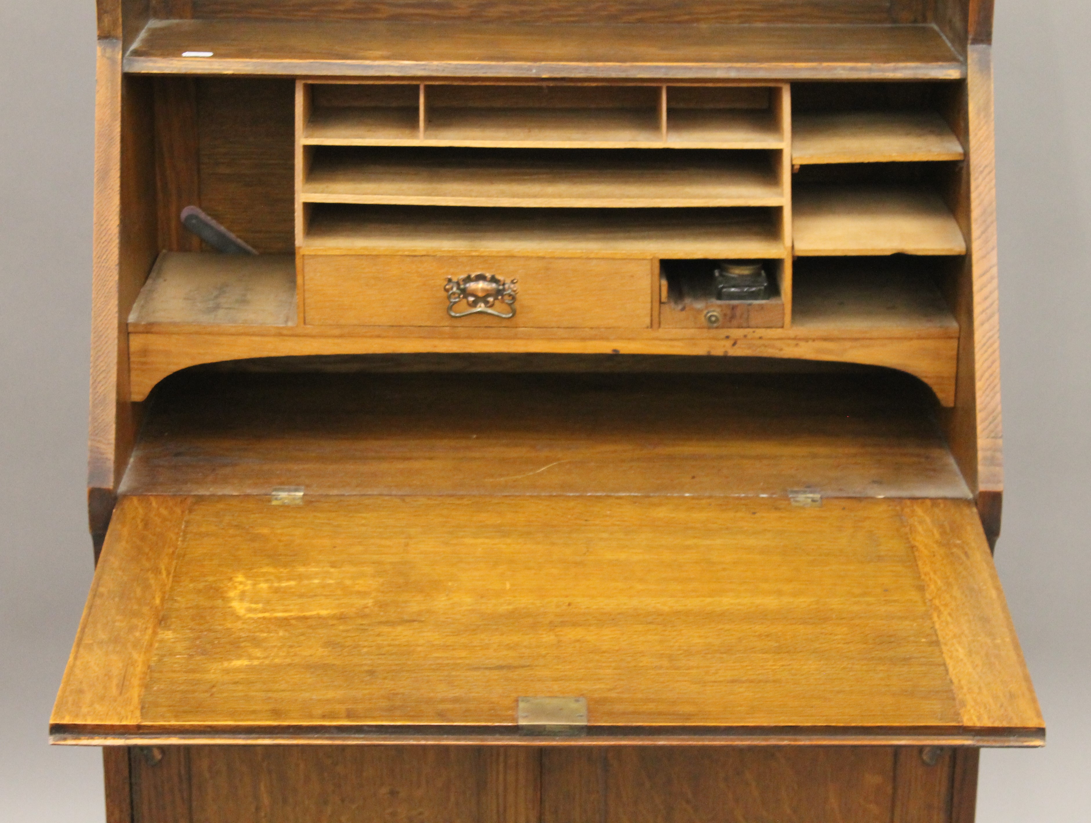 An Arts and Crafts oak hall bureau bookcase. 76 cm wide. - Image 6 of 11