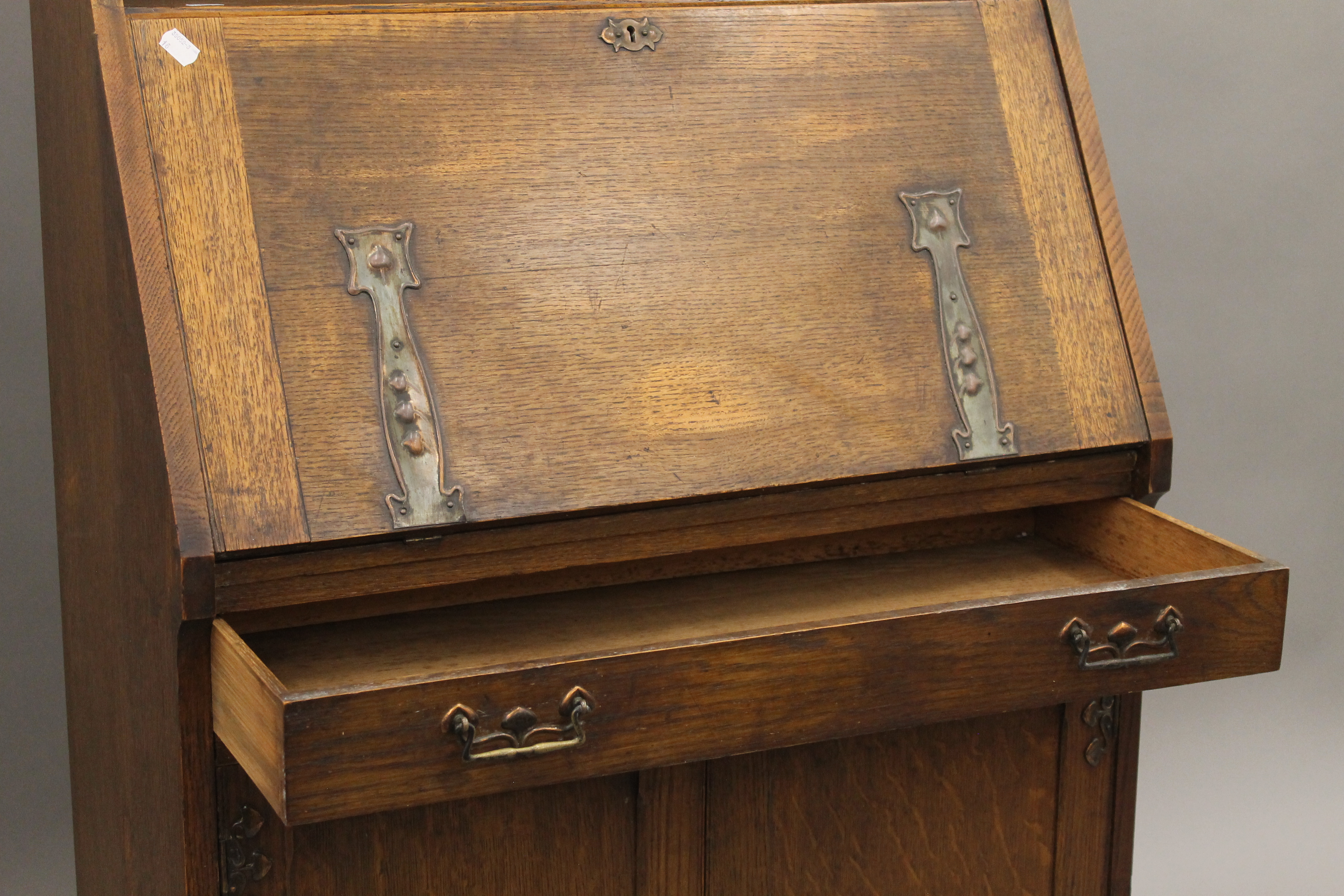 An Arts and Crafts oak hall bureau bookcase. 76 cm wide. - Image 8 of 11