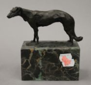 A small bronze model of a greyhound. 15 cm high.