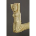 A walking stick with a carved bone handle formed as a nude lady. 93 cm long.