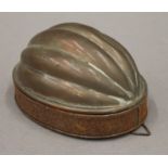 A Victorian tinned copper mould. 14.5 cm long.