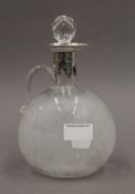 A Victorian silver collared engraved glass claret jug. 22 cm high.
