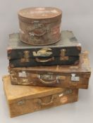 Four various vintage suitcases. The largest 80.5 cm wide.