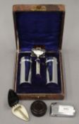 A vintage shaving set, a miniature Razorette razor,