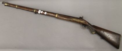 An antique musket. 127.5 cm long.