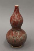 A Chinese double gourd porcelain vase. 20 cm high.